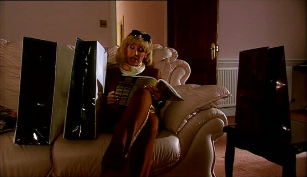 BUT THE CARPET WAREHOUSE KEEPS EDDIE WORKING LIKE A BLACK, 