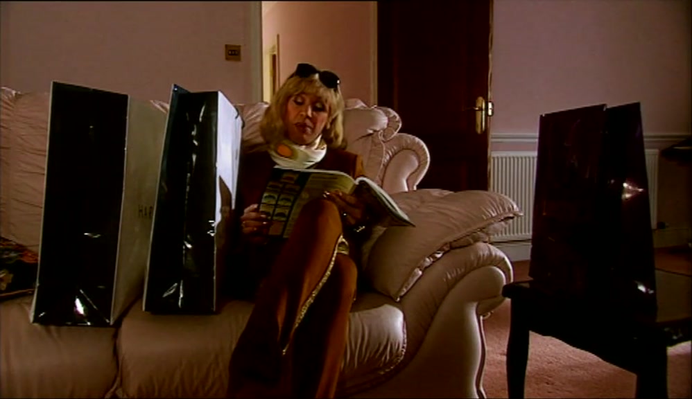 BUT THE CARPET WAREHOUSE KEEPS EDDIE WORKING LIKE A BLACK, 