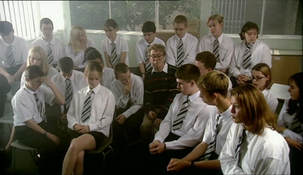 THERE'S A FEW GIGGLES. HANDS UP.  