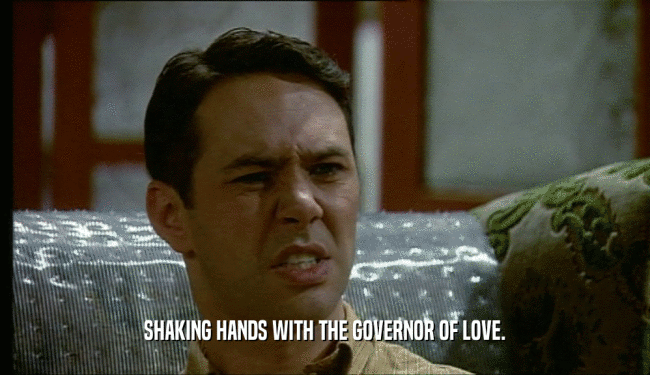 SHAKING HANDS WITH THE GOVERNOR OF LOVE.  