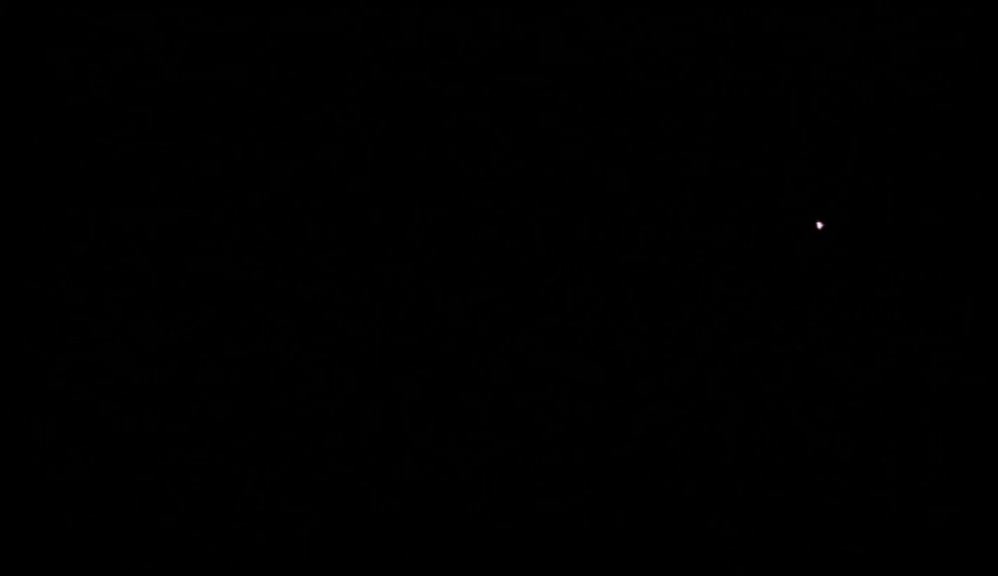 IT'S IN THE DARKNESS I SEE THE BOY'S FACE.  