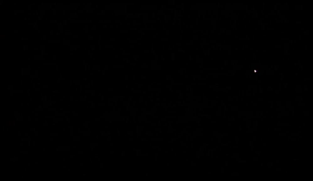 IT'S IN THE DARKNESS I SEE THE BOY'S FACE.  