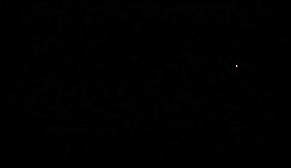 IT'S IN THE DARKNESS I SEE THE BOY'S FACE.  