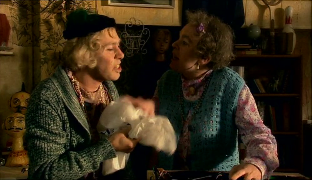 I SEE! HE'S BROUGHT US A CASSETTE! THANK YOU, DEAR. 