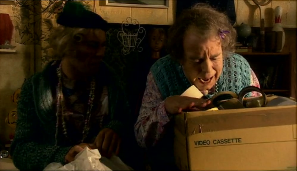JUST A MINUTE, DEAR. I'VE GOT THE TAPES. WHAT TAPE DOES HE WANT? 