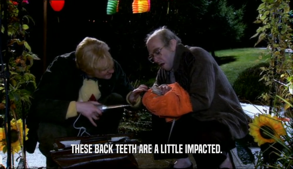 THESE BACK TEETH ARE A LITTLE IMPACTED.  