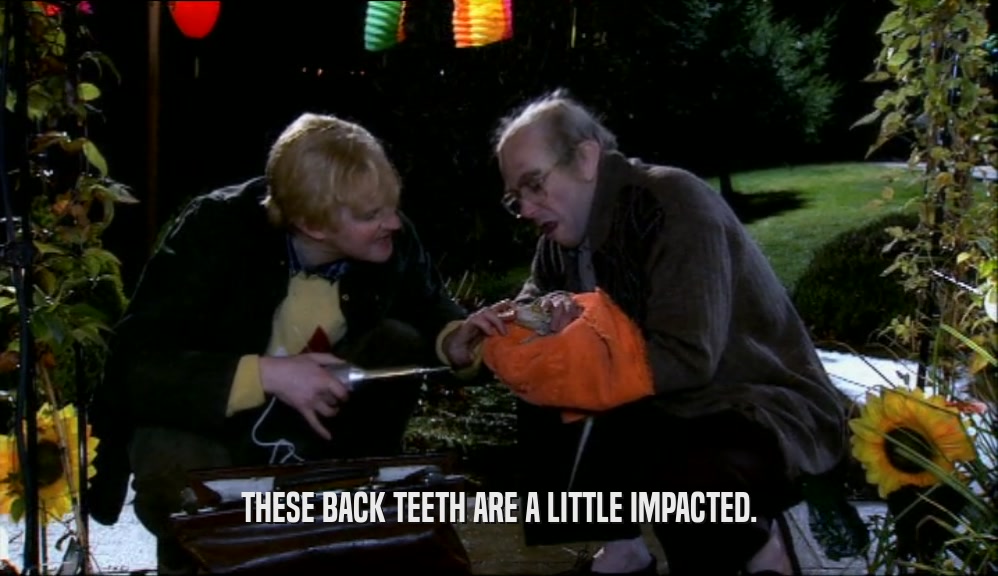 THESE BACK TEETH ARE A LITTLE IMPACTED.  