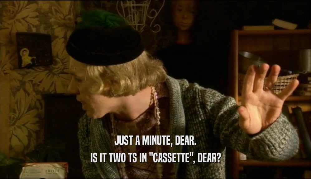 JUST A MINUTE, DEAR. IS IT TWO TS IN 