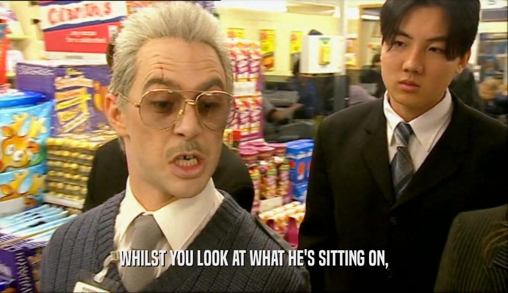 WHILST YOU LOOK AT WHAT HE'S SITTING ON,  