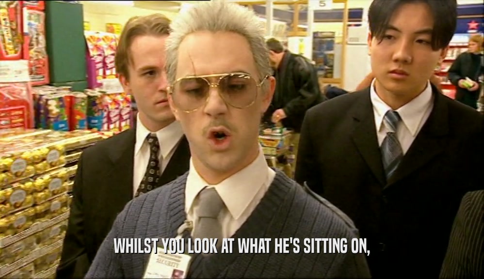 WHILST YOU LOOK AT WHAT HE'S SITTING ON,  