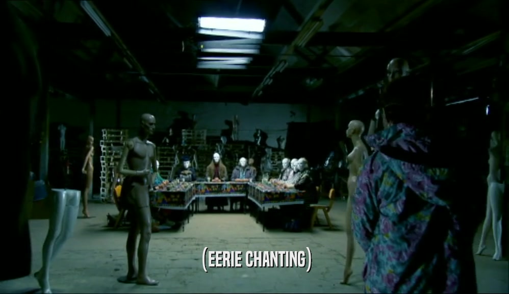 (EERIE CHANTING)  