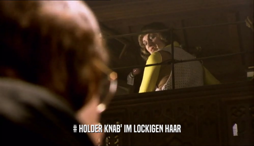 # HOLDER KNAB' IM LOCKIGEN HAAR  