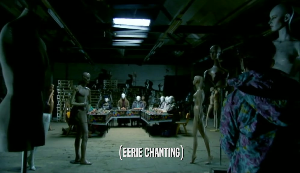 (EERIE CHANTING)  