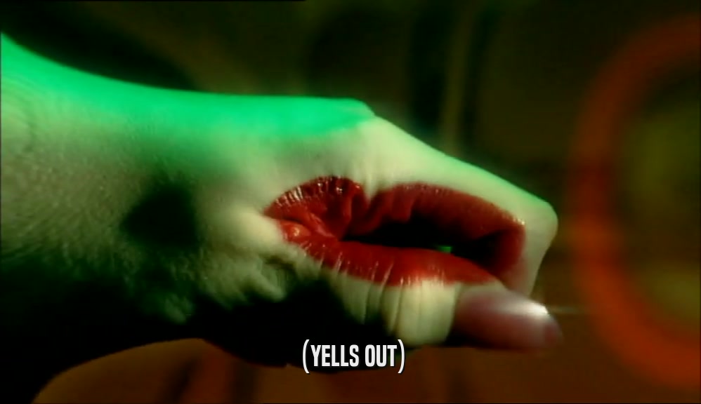 (YELLS OUT)  