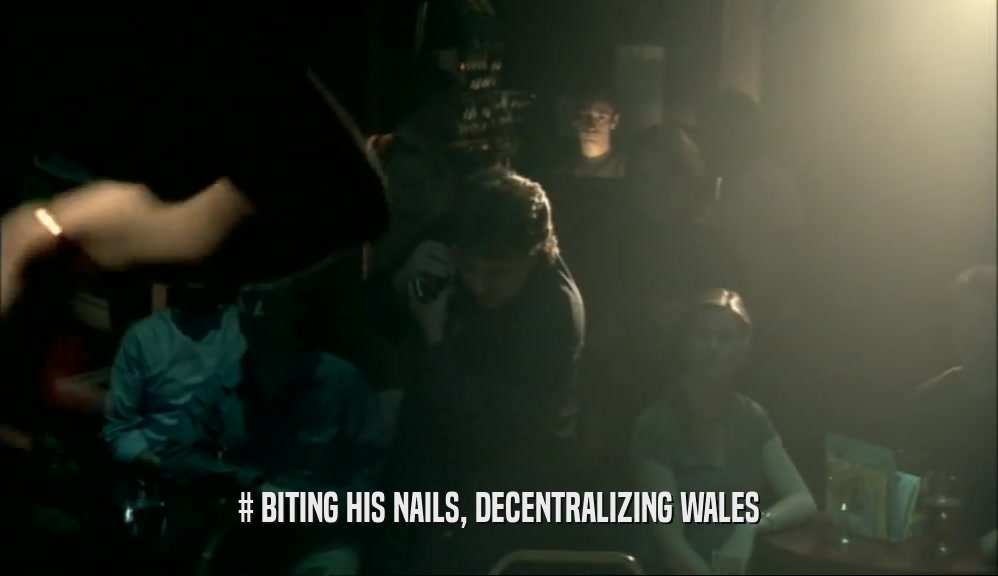 # BITING HIS NAILS, DECENTRALIZING WALES  
