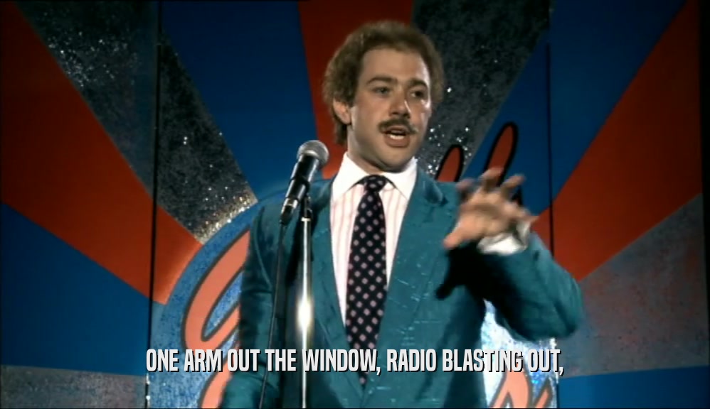 ONE ARM OUT THE WINDOW, RADIO BLASTING OUT,  