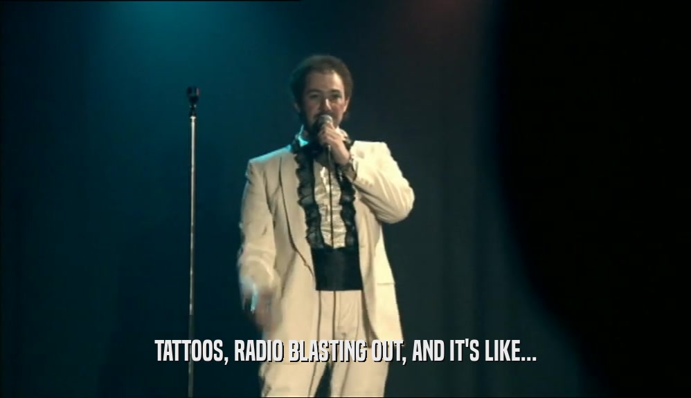 TATTOOS, RADIO BLASTING OUT, AND IT'S LIKE...  