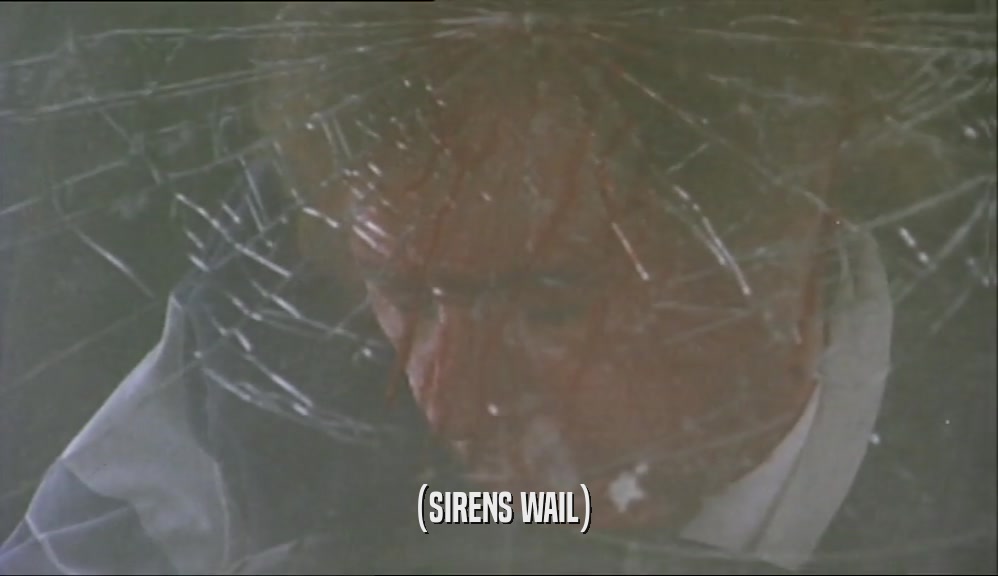 (SIRENS WAIL)  