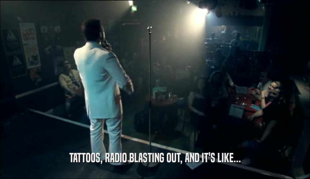TATTOOS, RADIO BLASTING OUT, AND IT'S LIKE...  