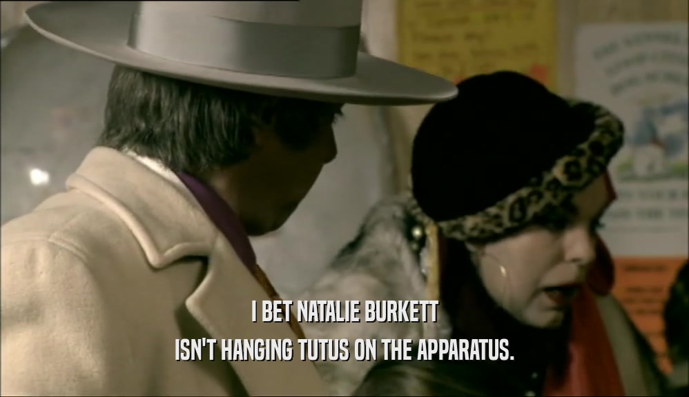 I BET NATALIE BURKETT ISN'T HANGING TUTUS ON THE APPARATUS. 