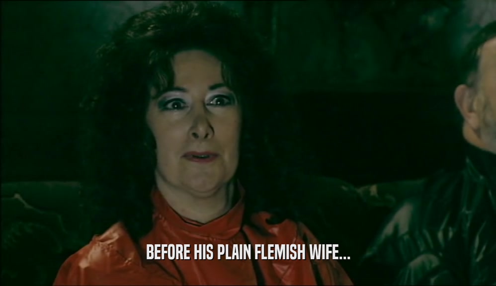 BEFORE HIS PLAIN FLEMISH WIFE...  