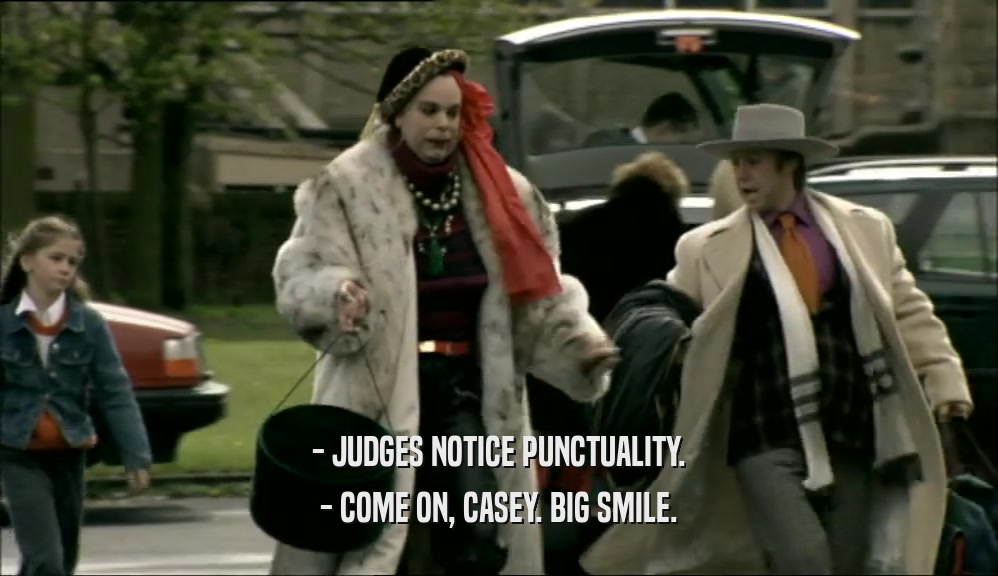 - JUDGES NOTICE PUNCTUALITY.
 - COME ON, CASEY. BIG SMILE.
 