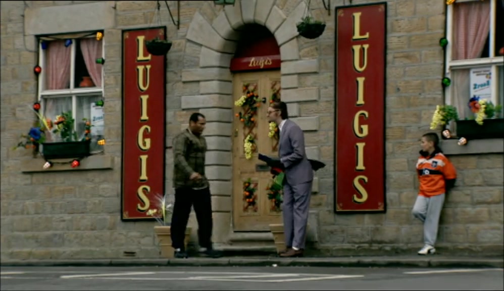 - CAN I TAKE YOUR COAT, SIGNORA? - NO, IT'S SAFER HERE. 
