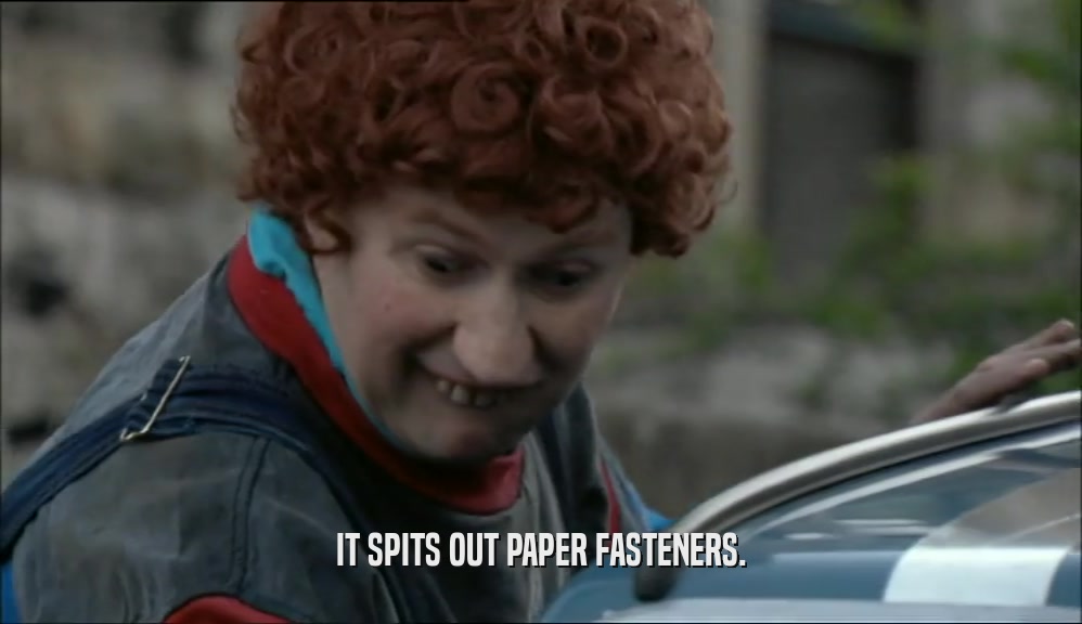 IT SPITS OUT PAPER FASTENERS.  