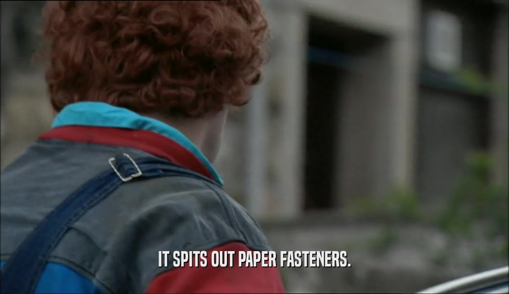 IT SPITS OUT PAPER FASTENERS.  