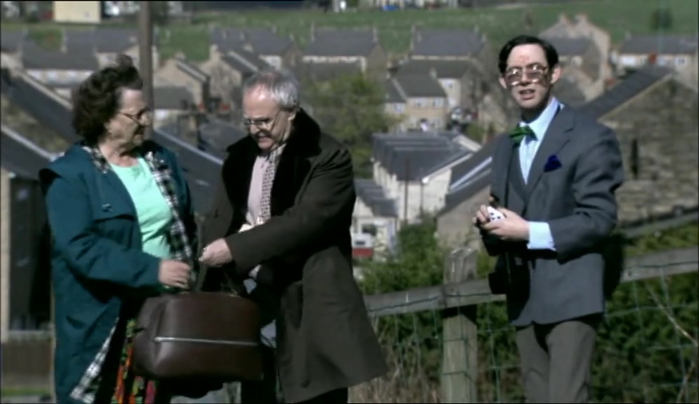 RIGHT. 'ERE, HOLD ME BAG.  