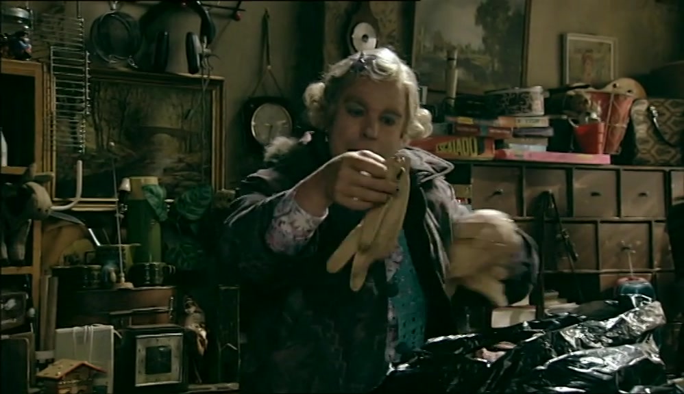 NOW, WHAT HAVE WE GOT HERE? OOH, SOME GLOVES. 