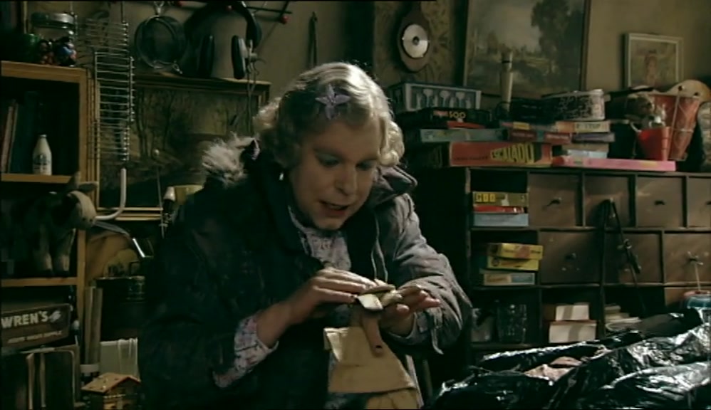 NOW, WHAT HAVE WE GOT HERE? OOH, SOME GLOVES. 