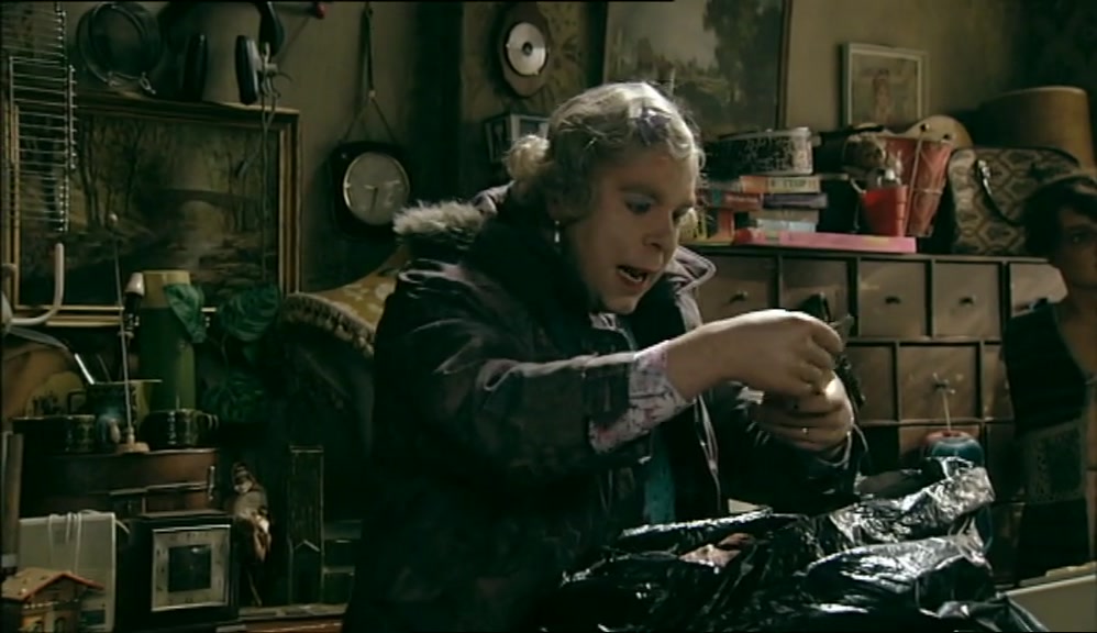 NOW, WHAT HAVE WE GOT HERE? OOH, SOME GLOVES. 