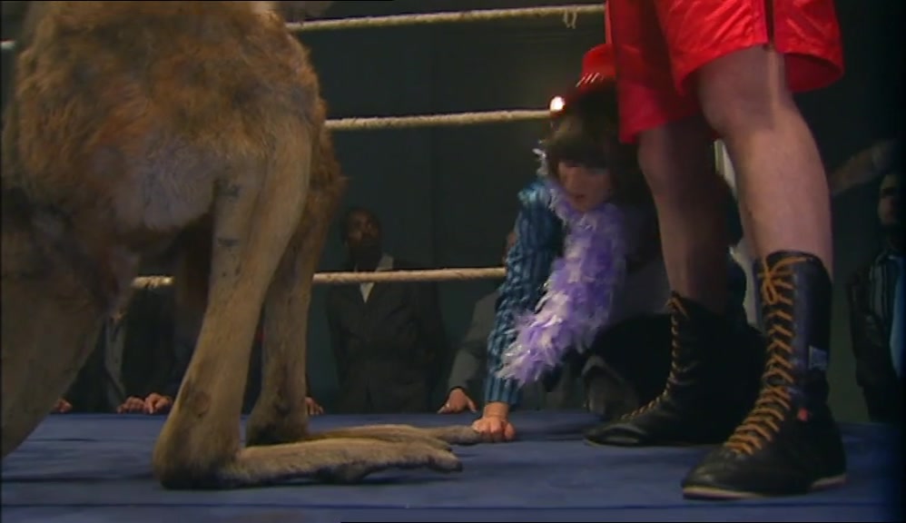 - (SPECTATORS SHOUTING) - (CRUNCHING) 