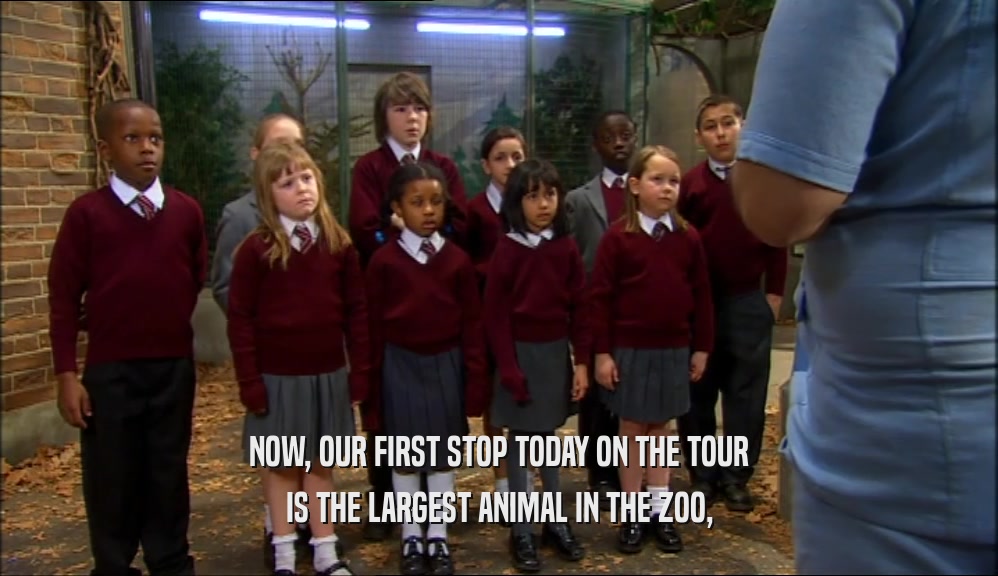 NOW, OUR FIRST STOP TODAY ON THE TOUR IS THE LARGEST ANIMAL IN THE ZOO, 