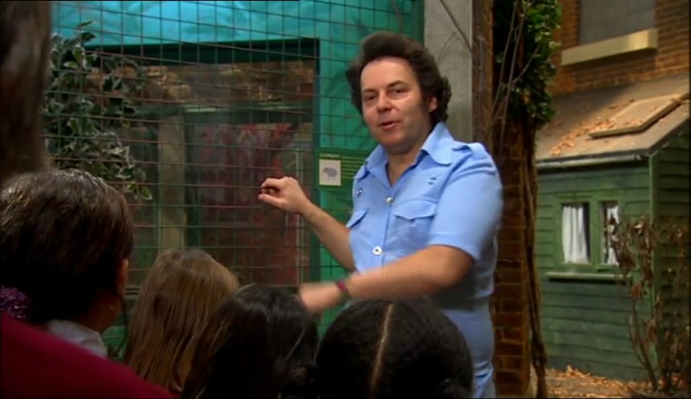 NOW, OUR FIRST STOP TODAY ON THE TOUR IS THE LARGEST ANIMAL IN THE ZOO, 