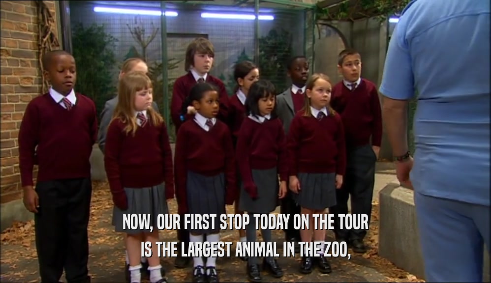NOW, OUR FIRST STOP TODAY ON THE TOUR IS THE LARGEST ANIMAL IN THE ZOO, 