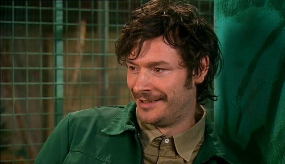 LOOK AT HIS HAIR. IT'S OVER A METRE TALL.  
