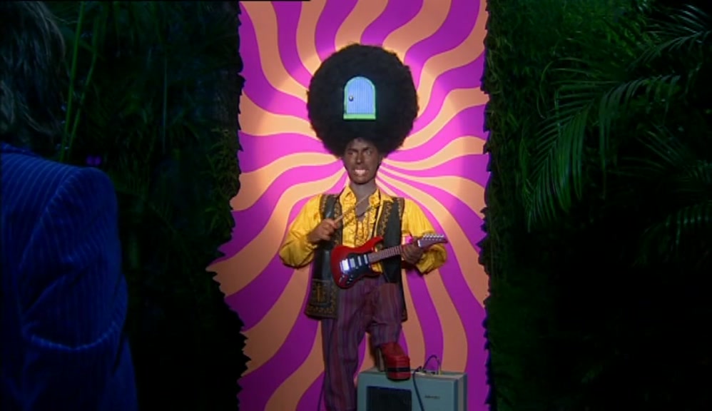 BUT HE IS DEEP IN THE CENTRE OF THE JUNGLE ROOM. 