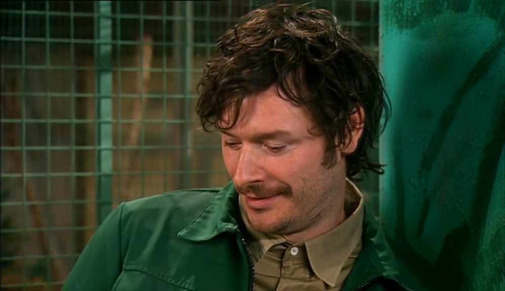 LOOK AT HIS HAIR. IT'S OVER A METRE TALL.  