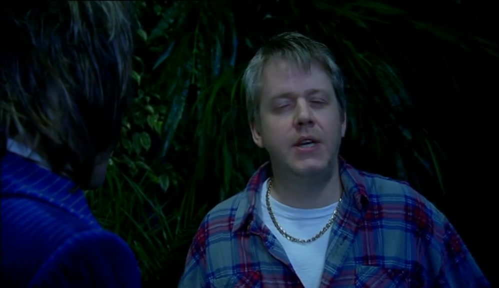 HE'S TALKING TO A GEEZER WITH A BIG HEAD.  