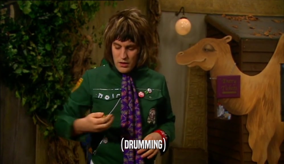 (DRUMMING)  