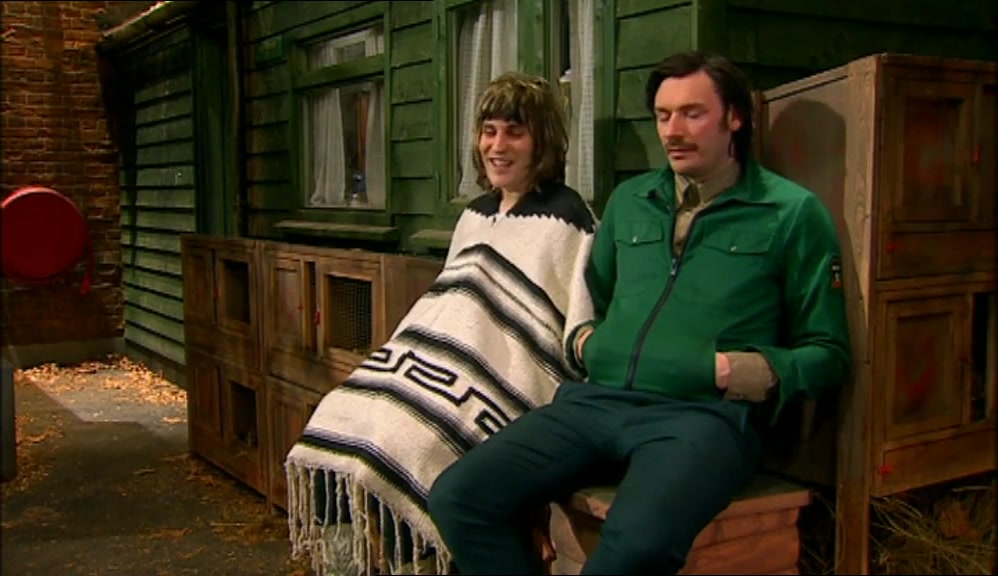IT'S THIS PONCHO. I CAN'T BELIEVE IT. IT'S IMPOSSIBLE TO BE UNHAPPY IN A PONCHO. 