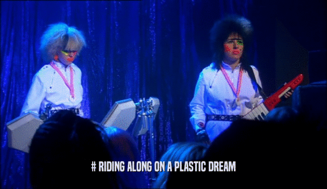 # RIDING ALONG ON A PLASTIC DREAM  