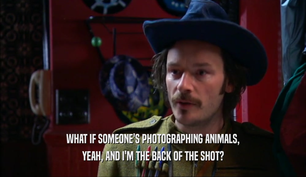 WHAT IF SOMEONE'S PHOTOGRAPHING ANIMALS, YEAH, AND I'M THE BACK OF THE SHOT? 