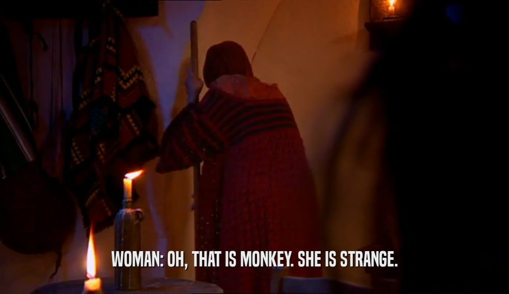 WOMAN: OH, THAT IS MONKEY. SHE IS STRANGE.  