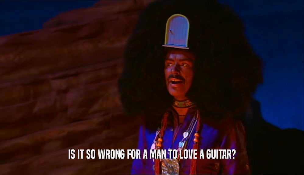 IS IT SO WRONG FOR A MAN TO LOVE A GUITAR?
  