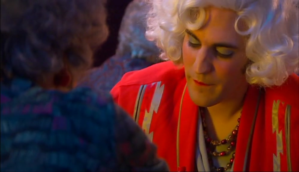 -WHAT COLOUR WAS HER CARDIGAN? -RED. 