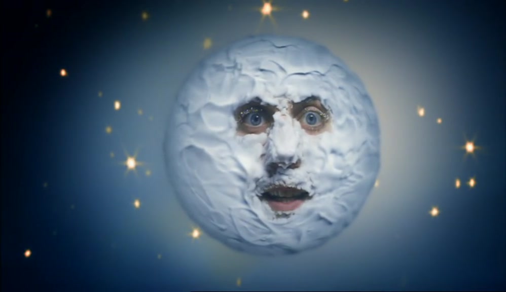 YES, WITH HIS EYES,  