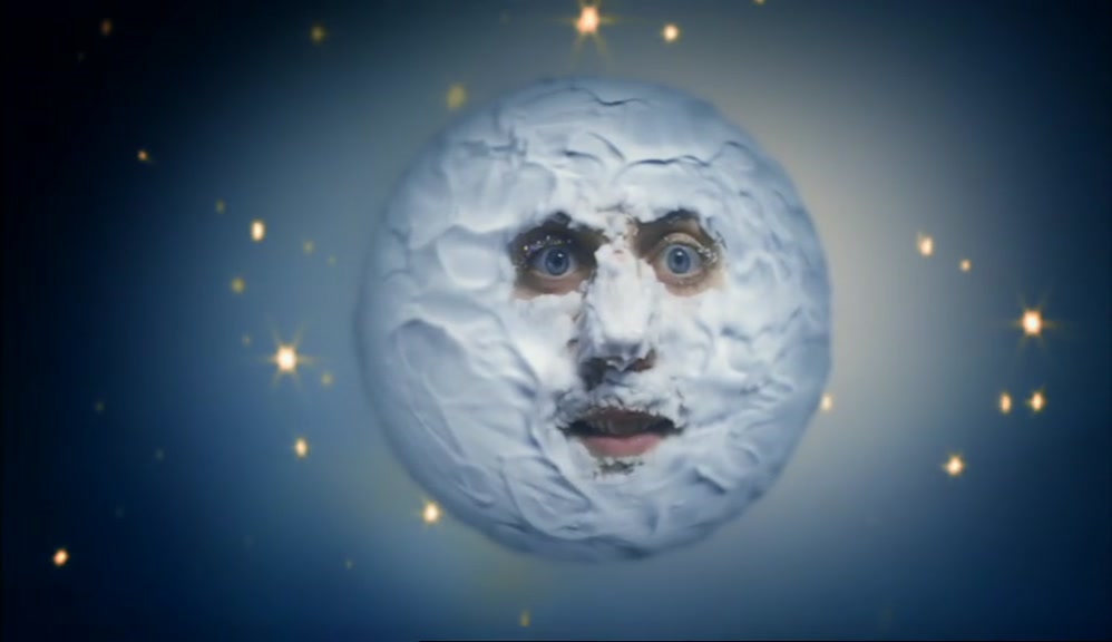 YES, WITH HIS EYES,  